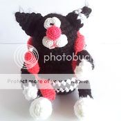 Crochet fat cat with sausages